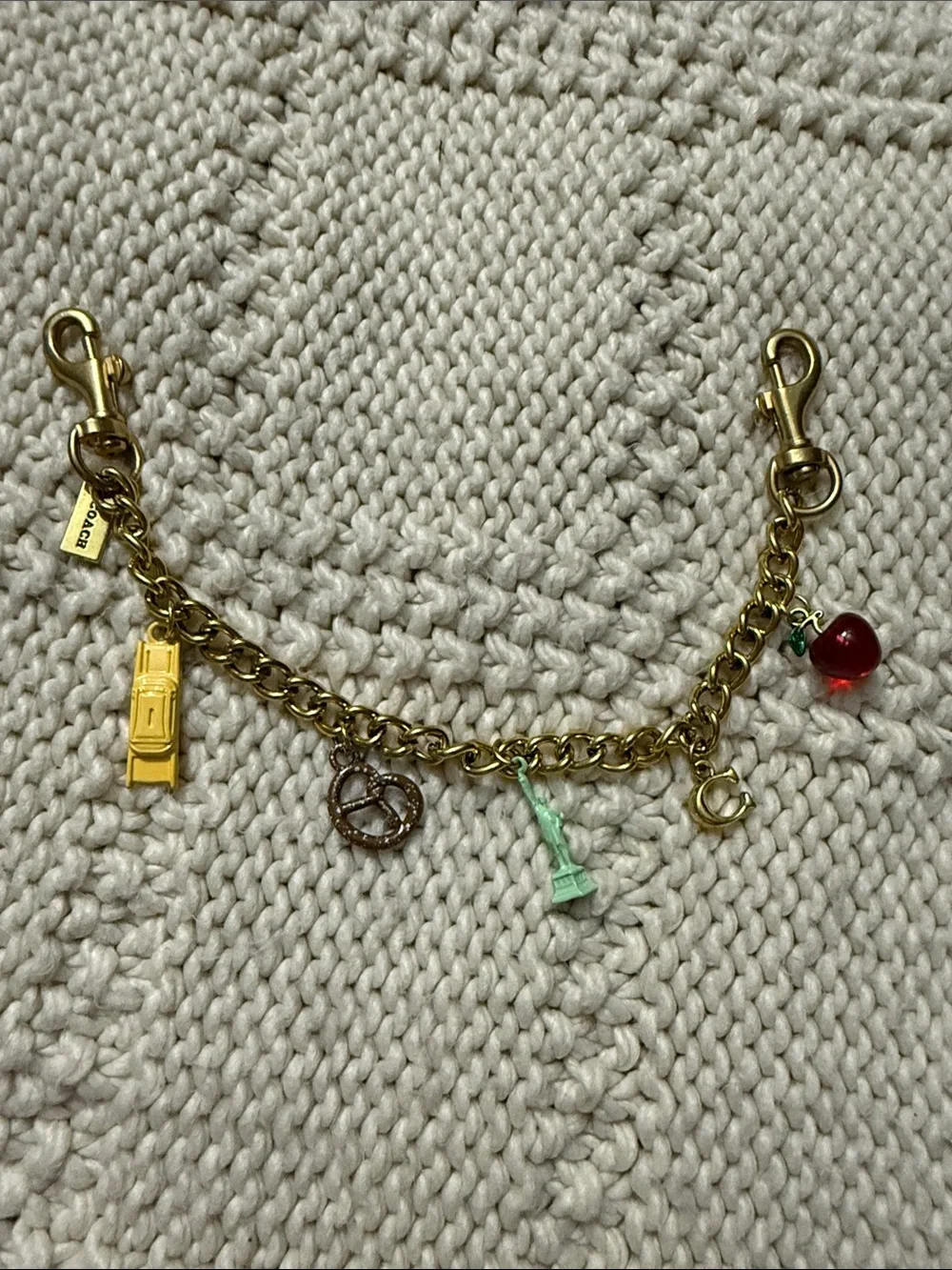 Coach Gold Charm Bracelet with Red, Yellow, Mint, and Rose-Gold Accents - Picture 3 of 6